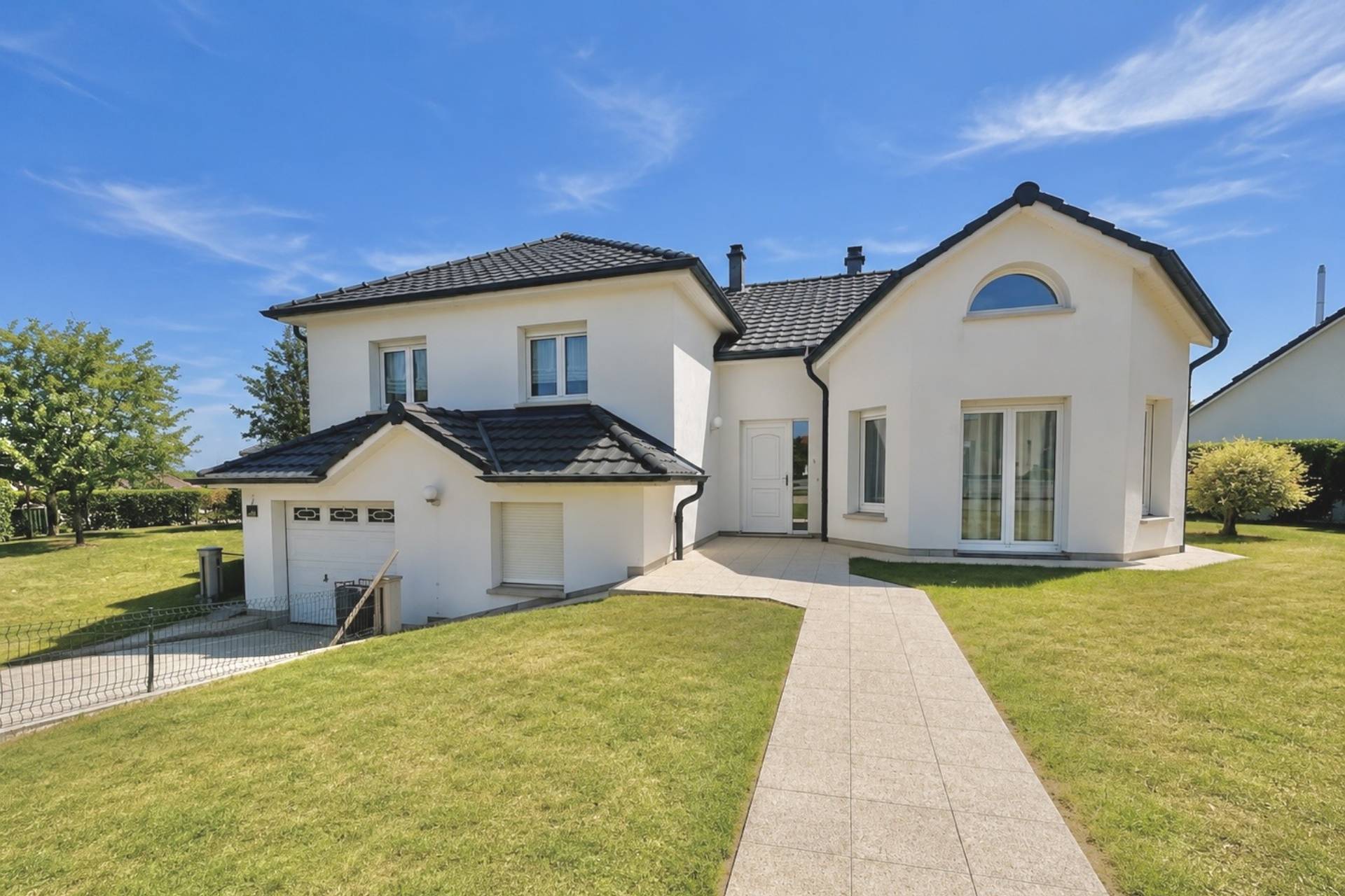 Maison individuelle avec jardin proposée par AXO Metz